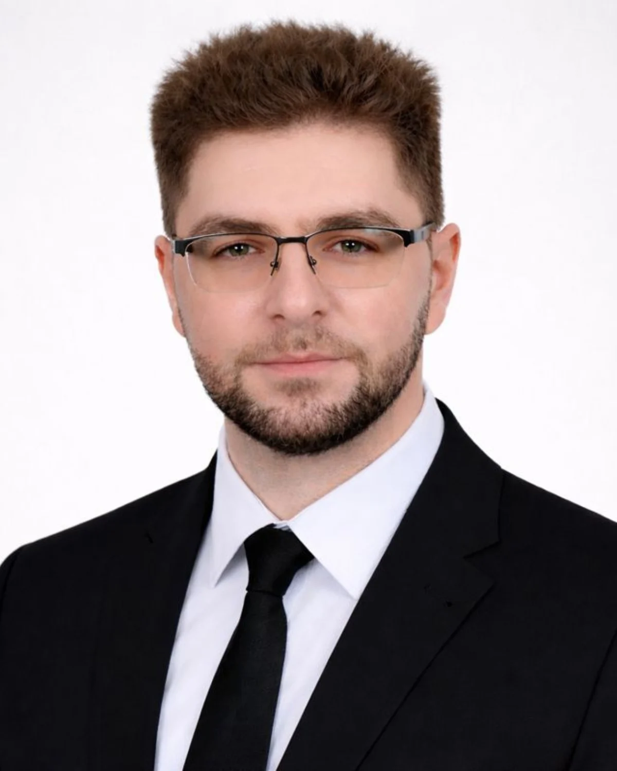 David Drabczuk, Business Development Executive, professional headshot in business attire